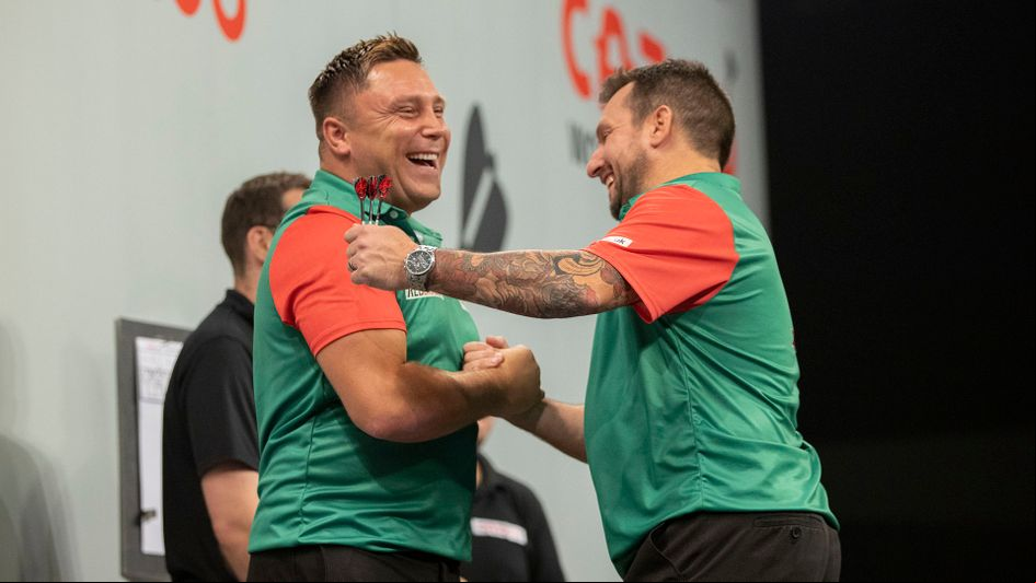 Gerwyn Price and Jonny Clayton celebrate for Wales (Picture: Lawrence Lustig/PDC)