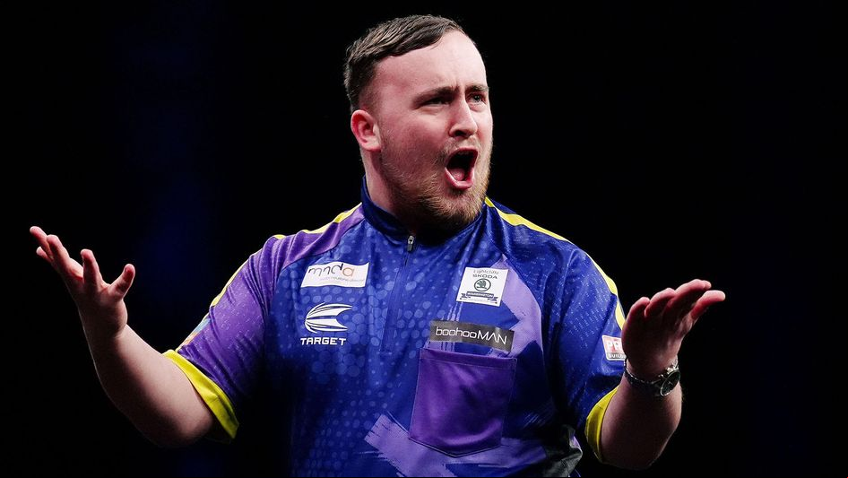 Luke Littler celebrates in the Premier League