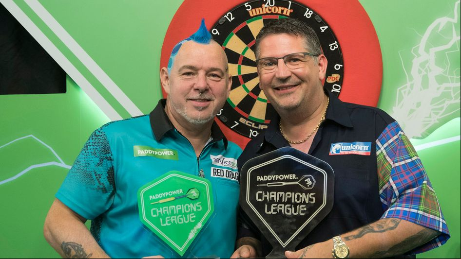 Gary Anderson and Peter Wright after the Champions League of Darts final (Picture: Lawrence Lustig)