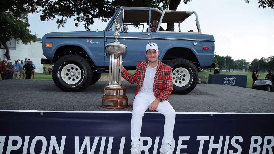 Emiliano Grillo celebrates with the trophy